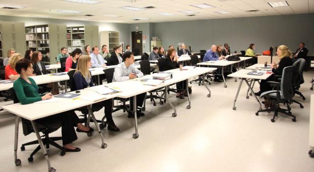 New archivists from the George W. Bush, William J. Clinton, George H.W. Bush, and Ronald Reagan Presidential Libraries attend a workshop about the Presidential Records Act.