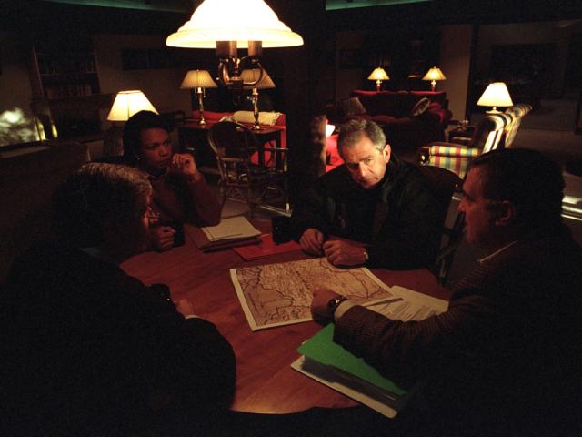 President George W. Bush meets with Chief of Staff Andy Card, National Security Advisor Condoleezza Rice and CIA Director George Tenet to discuss America's response to terrorism, September 29, 2001. (P7939-03)