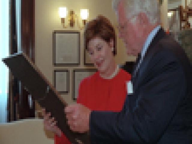 First Lady Laura Bush visits with Senator Edward M. Kennedy, September 11, 2001, in his Capitol Hill office. (P7107-19)