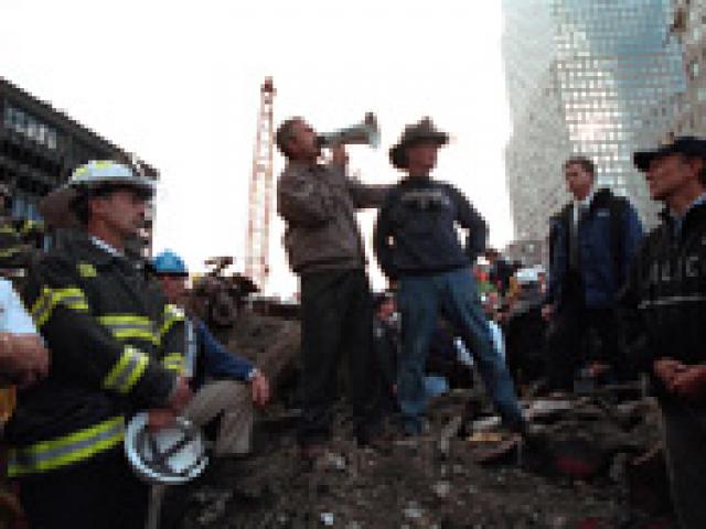 At the site of the World Trade Center in New York City on September 14, 2001, President George W. Bush pledged that the voices calling for justice from across the country would be heard. (P7365-23A)