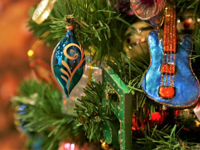A close up photo of musical themed holiday ornaments, part of the 2016 Holiday exhibit at the George W Bush Library and Museum