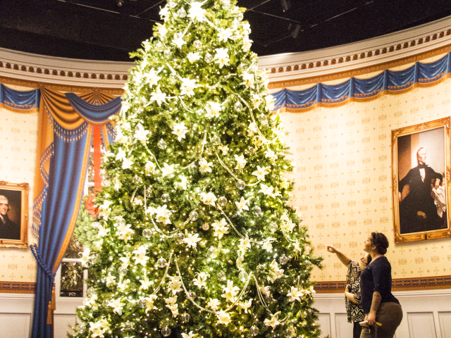 A photo of the replica 2005 Blue Room Christmas tree, part of the 2017 Holiday exhibit at the George W Bush Library and Museum