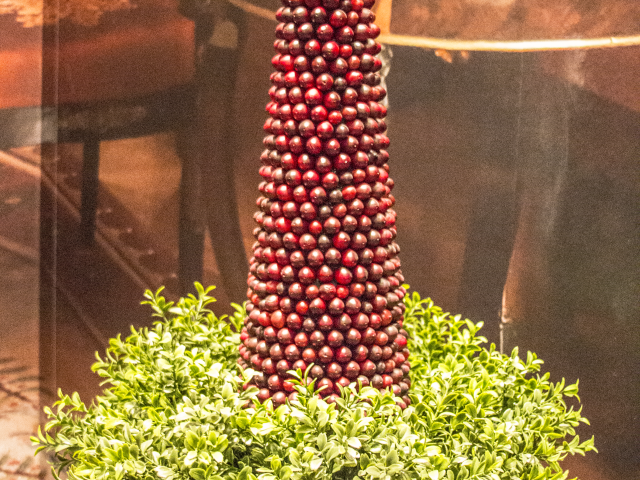 A picture of a cranberry holiday tree display, part of the 2017 Holiday exhibit at the George W Bush Library and Museum