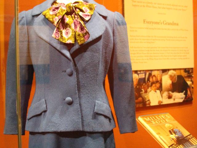 A picture of a suit worn by First Lady Barbara Bush, on display in the 2018 First Ladies exhibit at the George W Bush Library and Museum