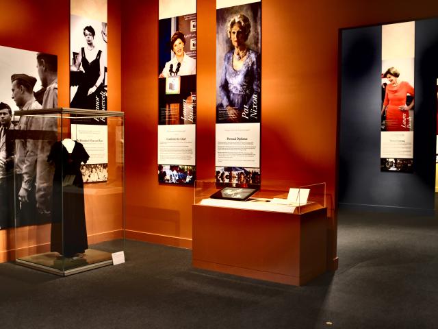 A photo from the 2018 First Ladies exhibit at the George W Bush Library and Museum featuring pictures of Pat Nixon, Laura Bush and Eleanor Roosevelt