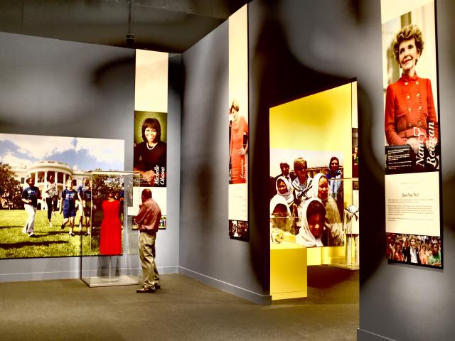 A picture of the 2018 First Ladies exhibit room featuring Michelle Obama and Nancy Reagan at the George W Bush Library and Museum