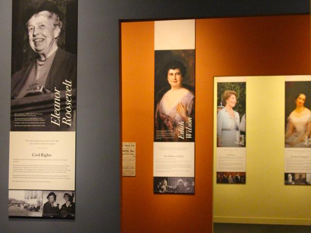 A photo looking into 3 different rooms with pictures of former first ladies, part of the 2018 First Ladies exhibit at the George W Bush Library and Museum