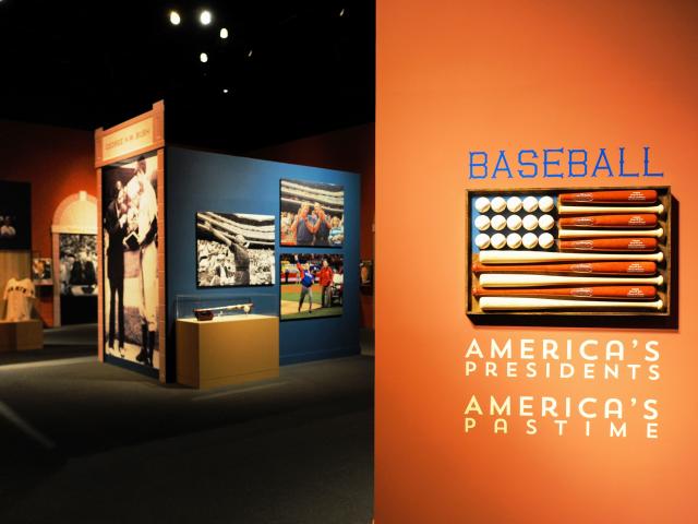 A photograph of the entrance to the 2015 exhibit 'Baseball: America's Presidents, America's Pastime,' at the George W Bush Library and Museum