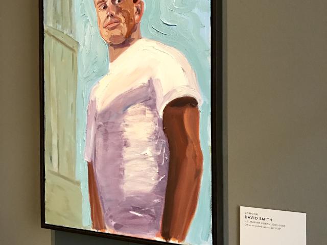 A photo of a portrait of Dave Smith by President George W Bush, part of the  2017 exhibit Portraits of Courage, at the George W Bush Library and Museum