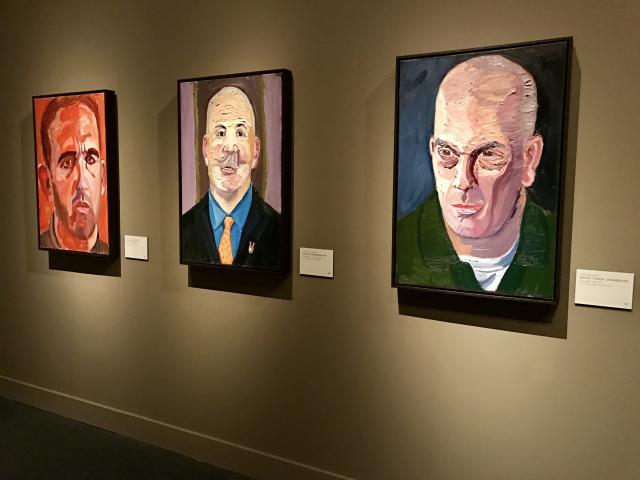 A photo of three portraits painted by President George W Bush, part of the 2017 exhibit Portraits of Courage, at the George W Bush Library and Museum