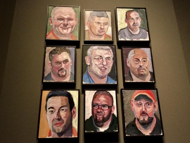 A close up photo of nine portraits painted by President George W Bush, from the 2017 exhibit Portraits of Courage, at the George W Bush Library and Museum 