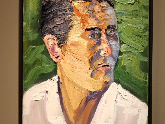 A photo of a portrait of Jay K Fain, Jr by President George W Bush, part of the 2017 exhibit Portraits of Courage, at the George W Bush Library and Museum