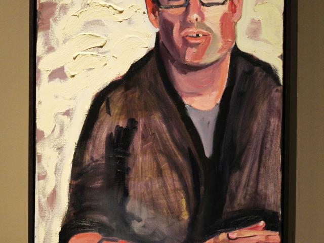 A photo of a portrait of Jeremy James Valdez by President George W Bush, part of the 2017 exhibit Portraits of Courage, at the George W Bush Library and Museum