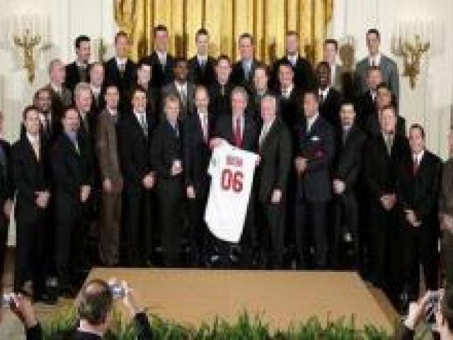 President George W. Bush stands with the 2006 World Series Champions, The St. Louis Cardinals, in the East Room of the White House on January 16, 2007.