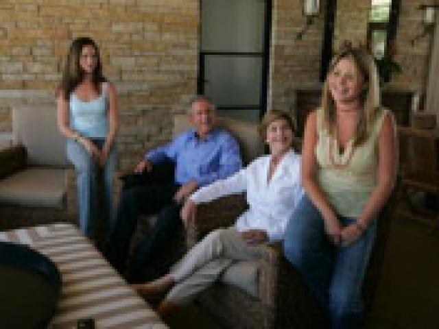 President George W. Bush and Mrs. Laura Bush relaxed with their daughters, Barbara and Jenna, August 24, 2004, during an interview for People Magazine at Prairie Chapel Ranch in Crawford, Texas.