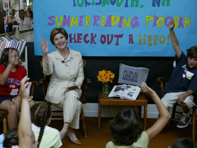 Laura Bush discusses the importance of reading with children participating in the No Child Left Behind Summer Reading Program at the Portsmouth Public Library in Portsmouth, New Hampshire, July 9, 2004.