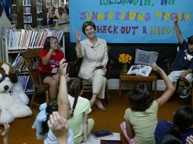 Laura Bush discusses the importance of reading with children participating in the No Child Left Behind Summer Reading Program at the Portsmouth Public Library in Portsmouth, New Hampshire, July 9, 2004.