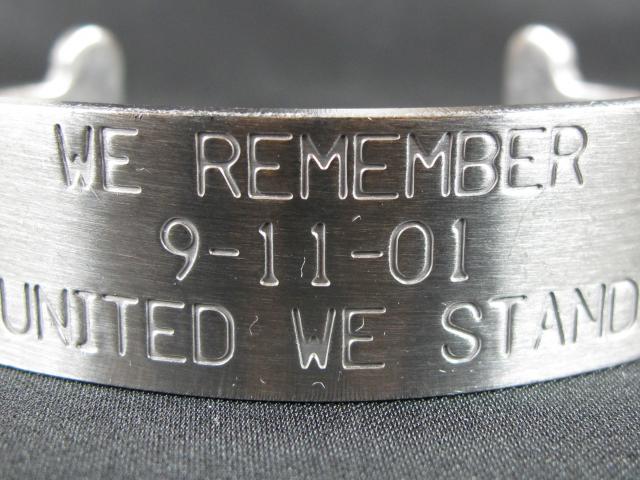 'Hearts of Steel,' bracelet engraved 'Let's Roll/ We Remember 9-11-01 United We Stand/ USA.'