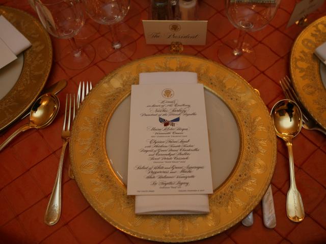 The dinner setting for President George W. Bush is seen, November 6, 2007, in the State Dining Room of the White House for the dinner in honor of French President Nicolas Sarkozy.