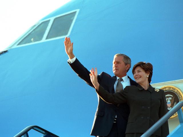 President George W. Bush and Mrs. Laura Bush wave before boarding Air Force One, June 13, 2001