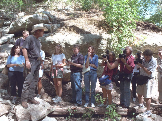 President Bush leads the White House Press Pool on a tour of his Crawford Ranch.