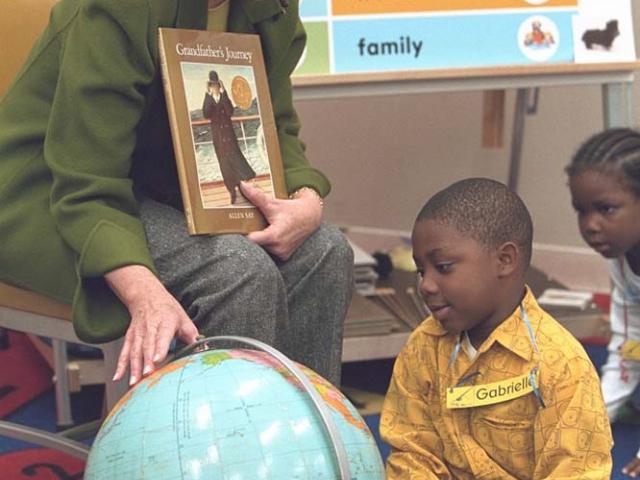 Mrs. Laura Bush reads to a group of students